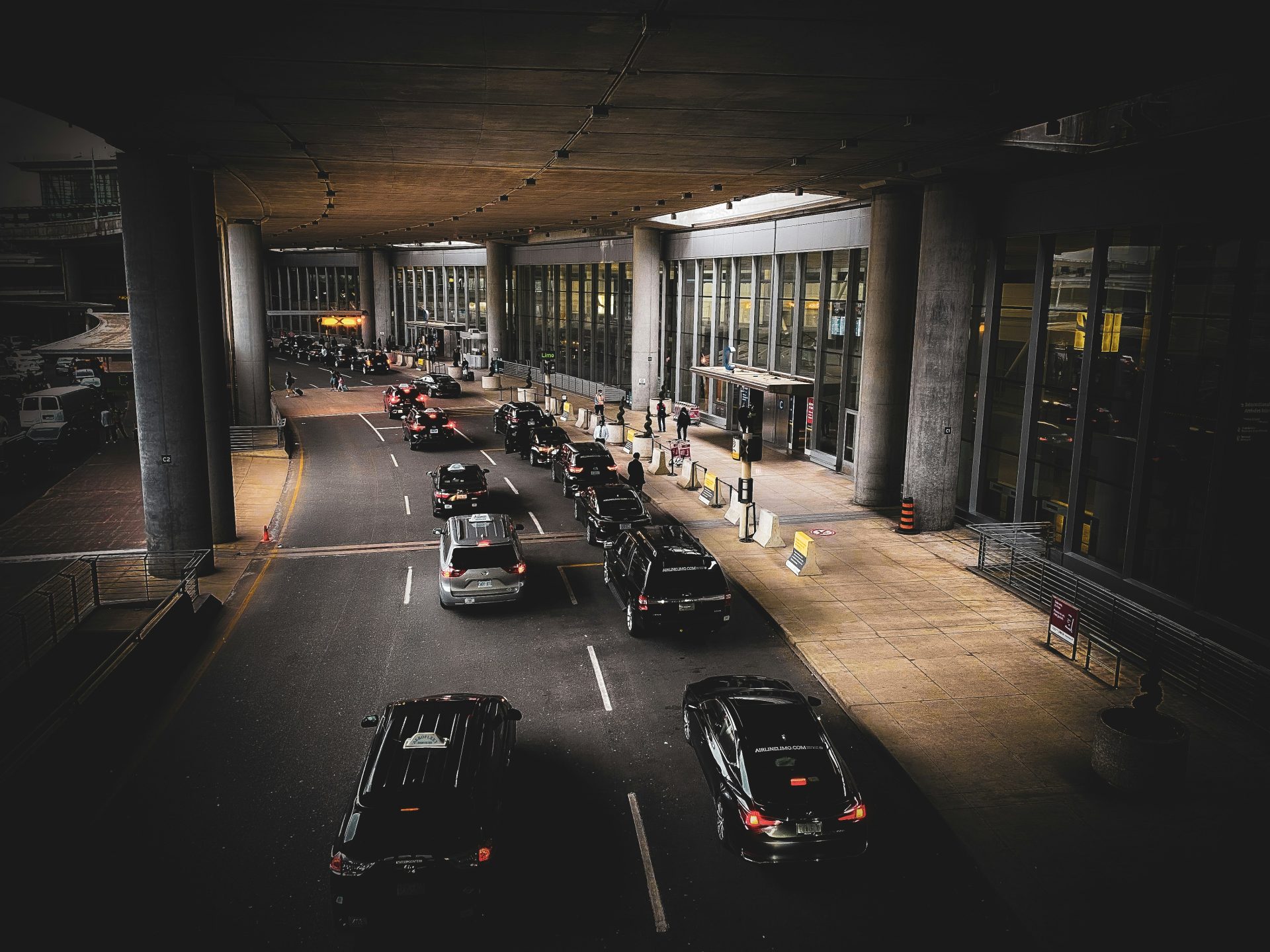 a group of cars parked in a parking lot